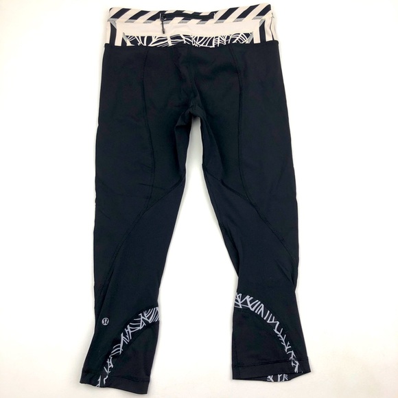 lululemon athletica Pants - Lululemon Inspire Crop 
Black / Pretty Palm Black Angel Wing
